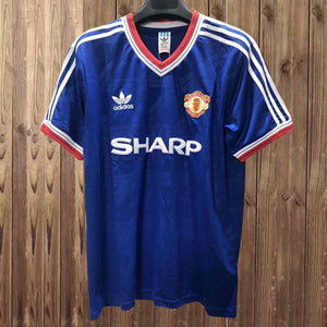 Camiseta de visitante MUFC 86-88